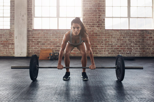 girl lifting weights