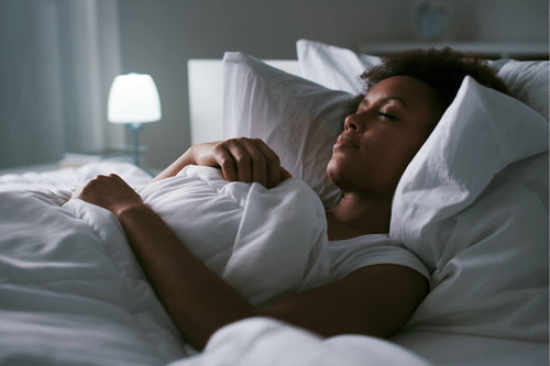 girl sleeping in bed