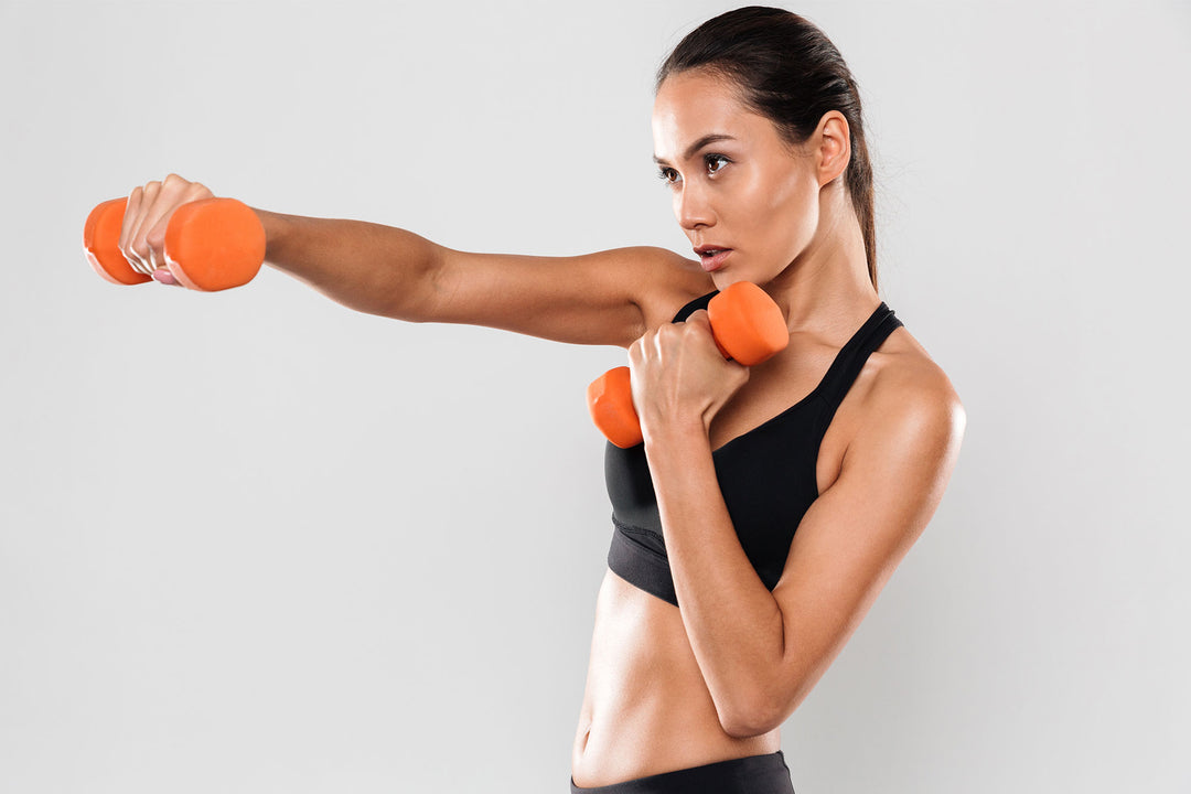 girl exercising with weights