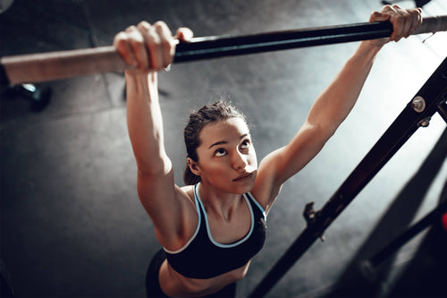 Woman doing pullups